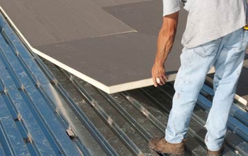benefits of insulating Tallarn Green flat roofing